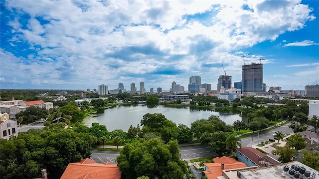 drone / aerial view with a view of city and a water view