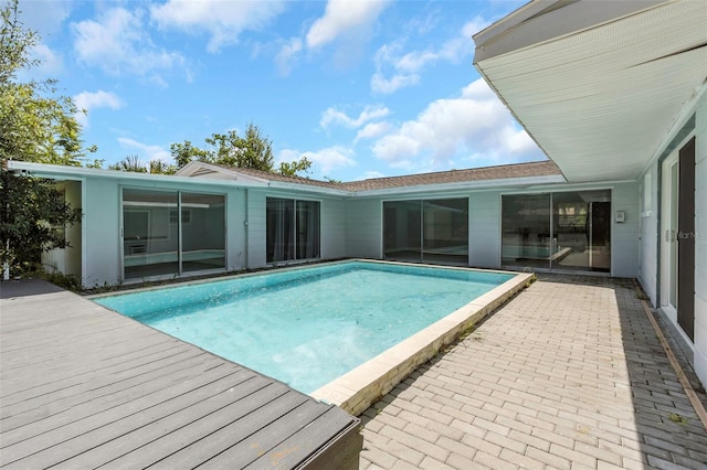 pool with a patio