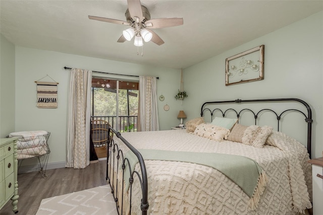 bedroom featuring access to exterior, ceiling fan, and wood-type flooring