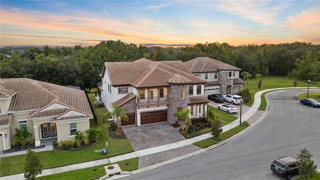 mediterranean / spanish house featuring a garage