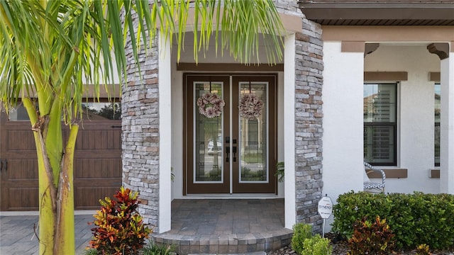 doorway to property featuring french doors