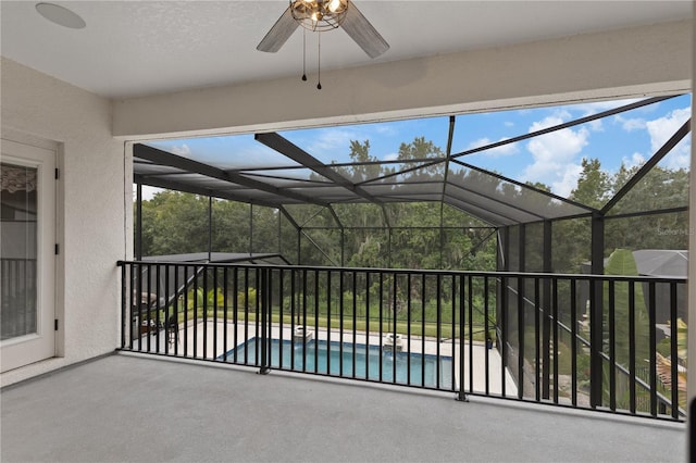 view of patio featuring a lanai and a fenced in pool