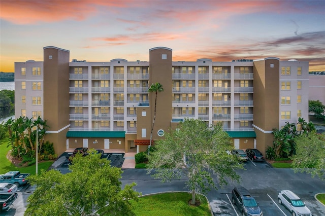 view of outdoor building at dusk