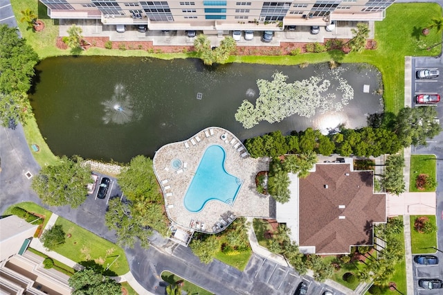 birds eye view of property featuring a water view