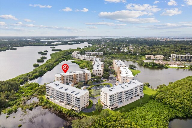 birds eye view of property featuring a water view