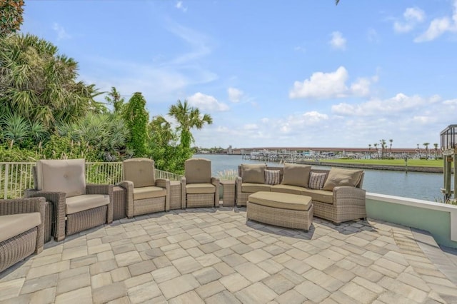 view of patio with a water view