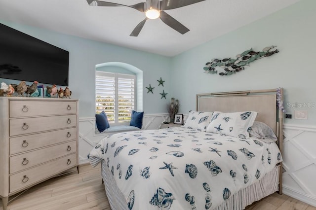 bedroom featuring ceiling fan and light hardwood / wood-style floors