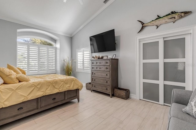 bedroom featuring crown molding and vaulted ceiling