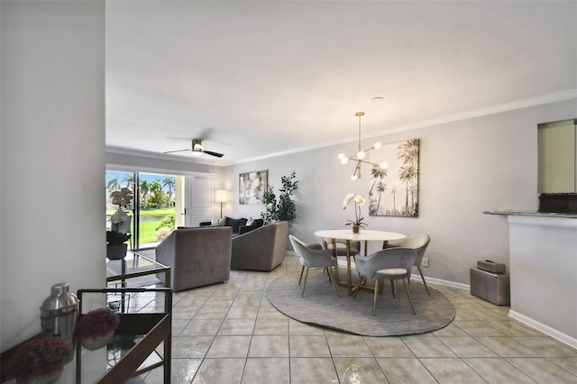 tiled dining room with ceiling fan with notable chandelier and crown molding