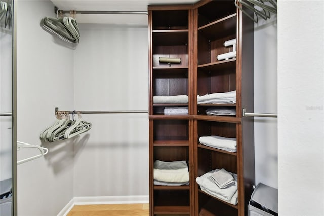 walk in closet featuring light wood-type flooring