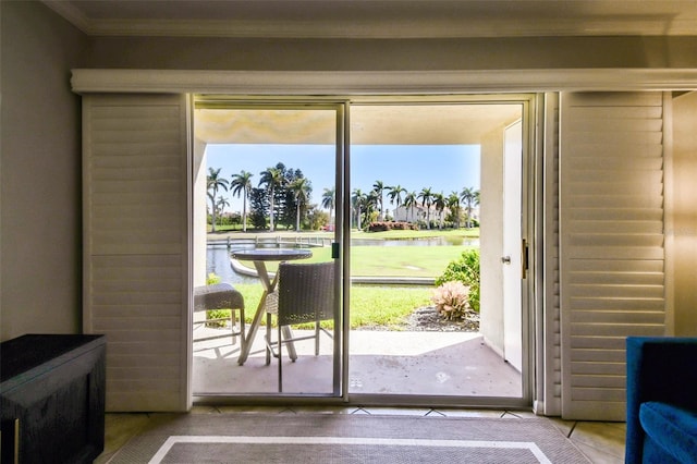 doorway featuring ornamental molding