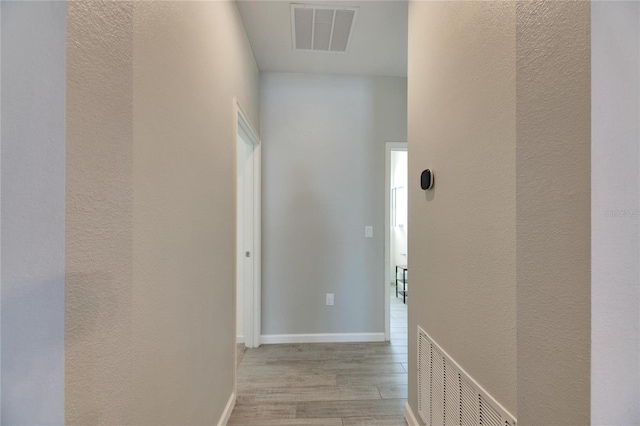 hall featuring light hardwood / wood-style flooring