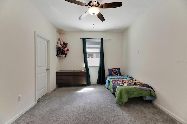 bedroom with light colored carpet and ceiling fan