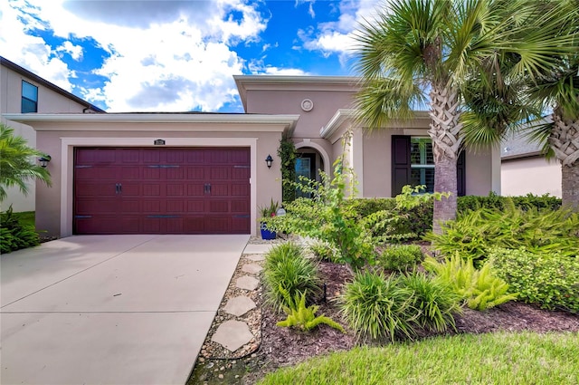 single story home featuring a garage