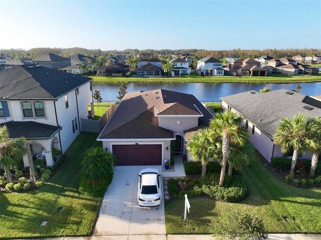 drone / aerial view featuring a water view