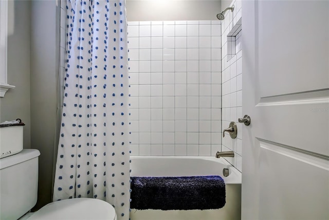 bathroom with toilet and shower / bathtub combination with curtain