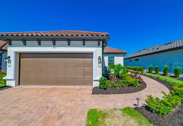 view of front of property featuring a garage