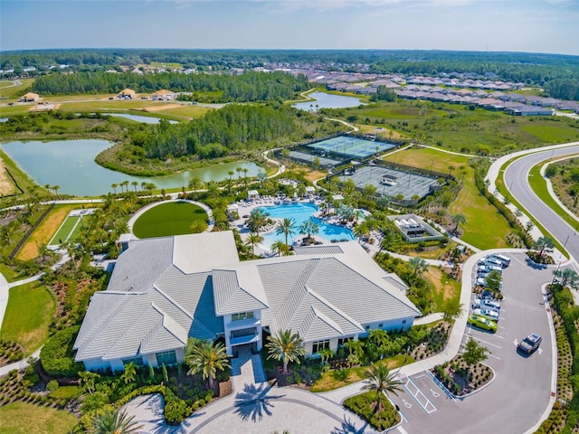 birds eye view of property featuring a water view