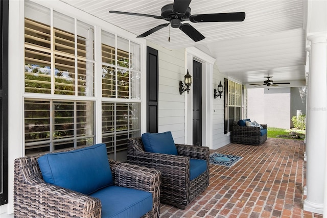 view of patio with a porch and ceiling fan