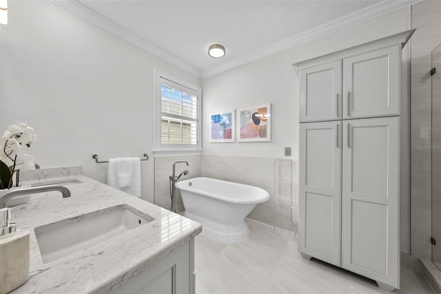 bathroom featuring vanity, crown molding, tile walls, and separate shower and tub