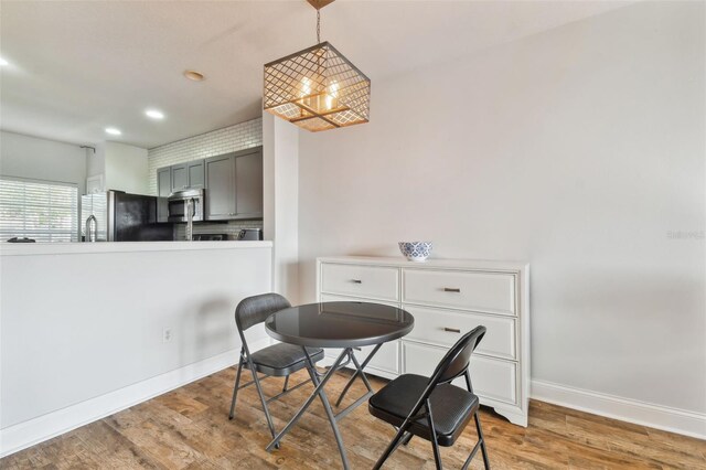 dining space featuring light hardwood / wood-style floors