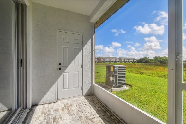 unfurnished sunroom with plenty of natural light