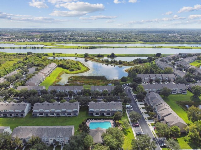 drone / aerial view with a water view