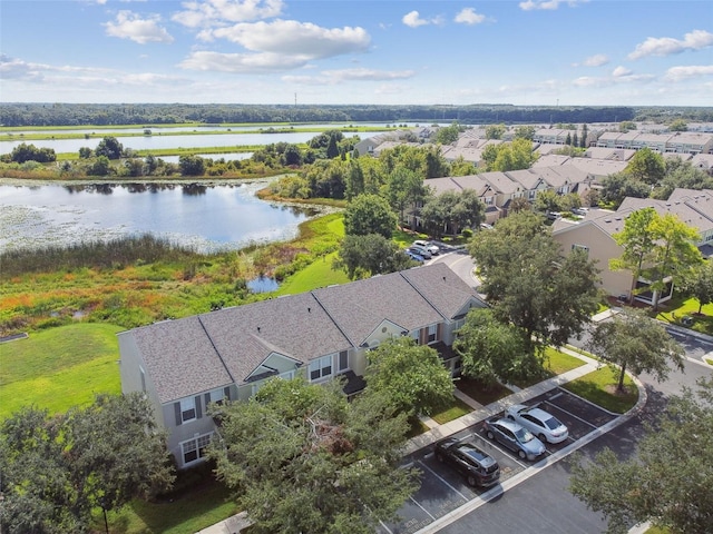 bird's eye view with a water view