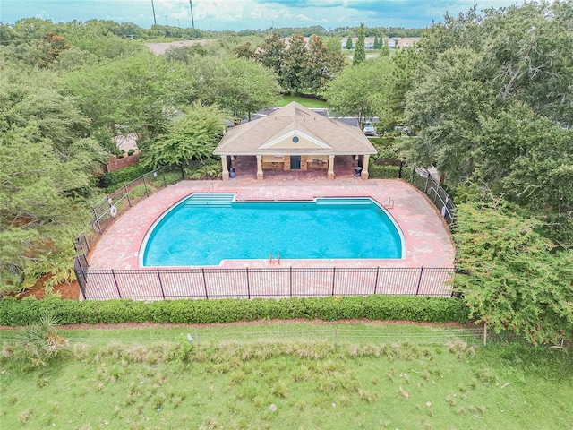 view of swimming pool with a patio