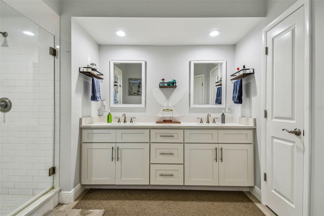 bathroom with vanity and walk in shower