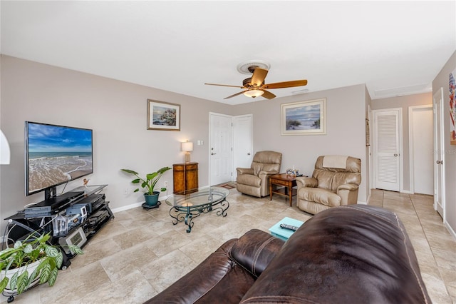 living room featuring ceiling fan