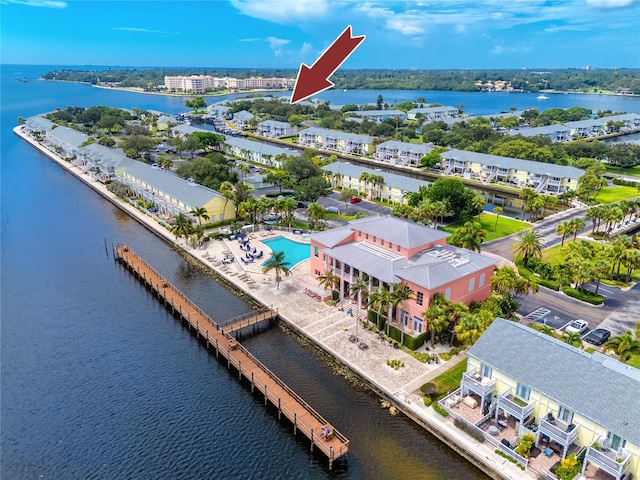 birds eye view of property featuring a water view