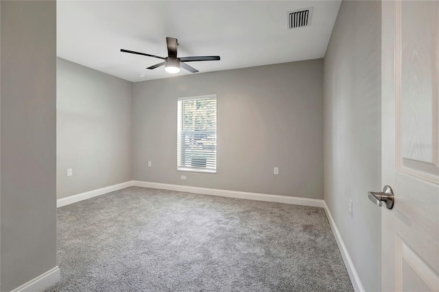 carpeted empty room with ceiling fan