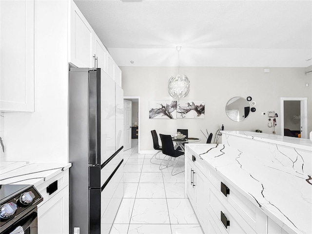 kitchen with white cabinets, pendant lighting, black electric range oven, and stainless steel refrigerator