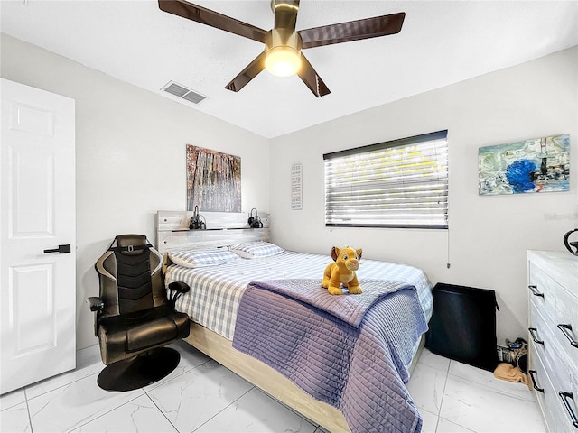 4477 67th St N, Saint Petersburg, FL 33709 - bedroom with visible vents, marble finish floor, and ceiling fan