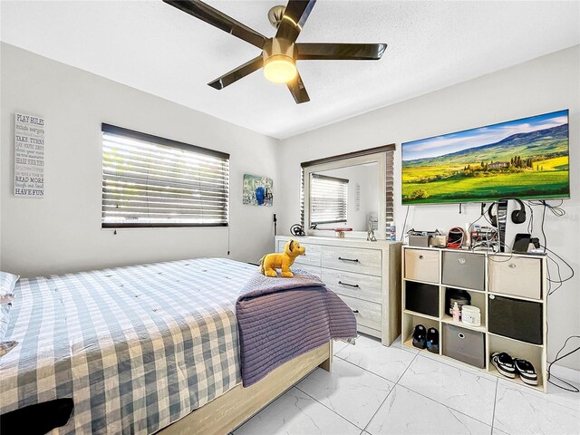 4477 67th St N, Saint Petersburg, FL 33709 - bedroom with marble finish floor and ceiling fan