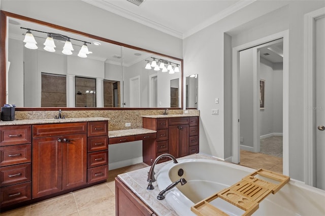 bathroom with a bathtub, crown molding, tile patterned flooring, and vanity