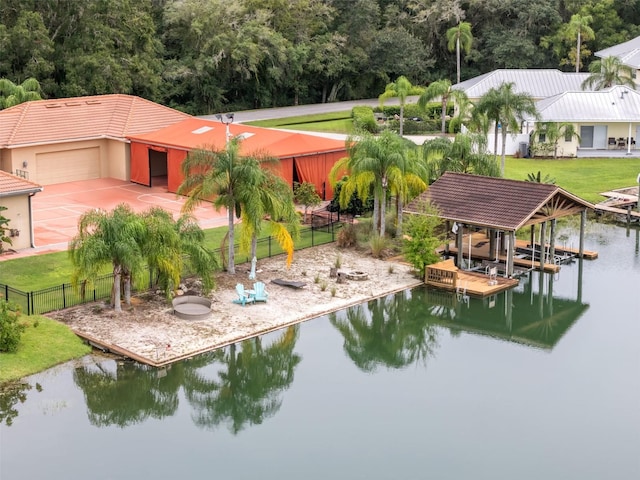 exterior space with a lawn and a water view