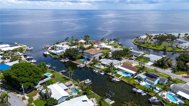 bird's eye view with a water view