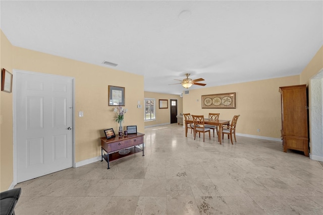 dining room with ceiling fan