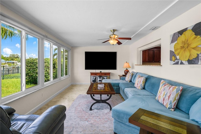 living room featuring ceiling fan