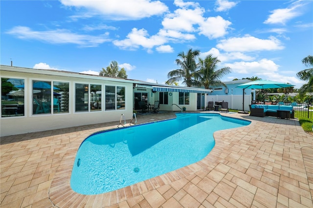 view of swimming pool featuring a patio