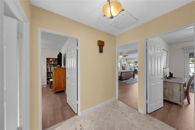 hall featuring light hardwood / wood-style floors