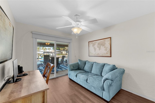 office space with hardwood / wood-style flooring and ceiling fan