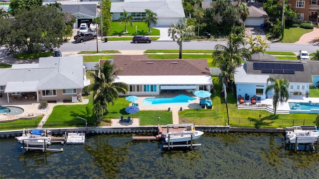 bird's eye view with a water view