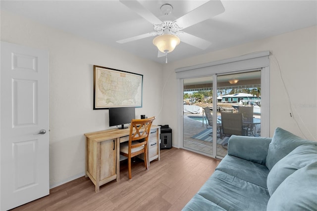 office area with hardwood / wood-style floors and ceiling fan