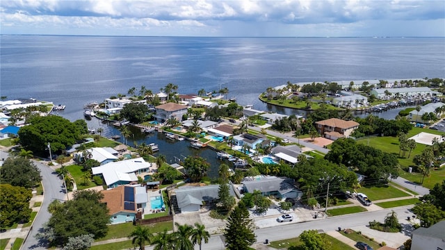 bird's eye view with a water view