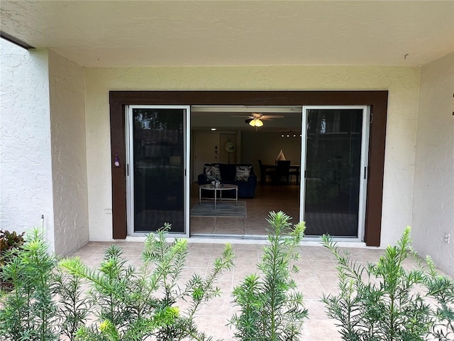 property entrance featuring a patio