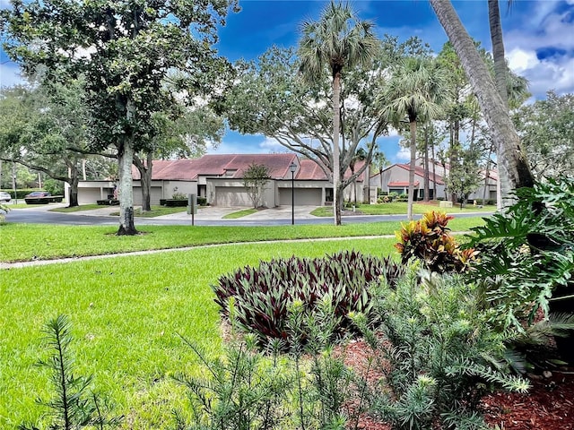 view of yard with a garage