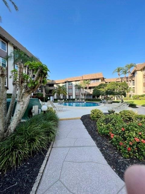 view of home's community featuring a pool